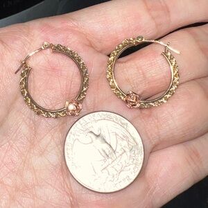 10kt Elegant Gold Hoop Earrings with Floral Detail. Stamps on them